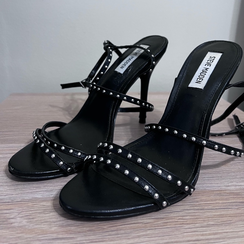 Studded ankle straps heels.